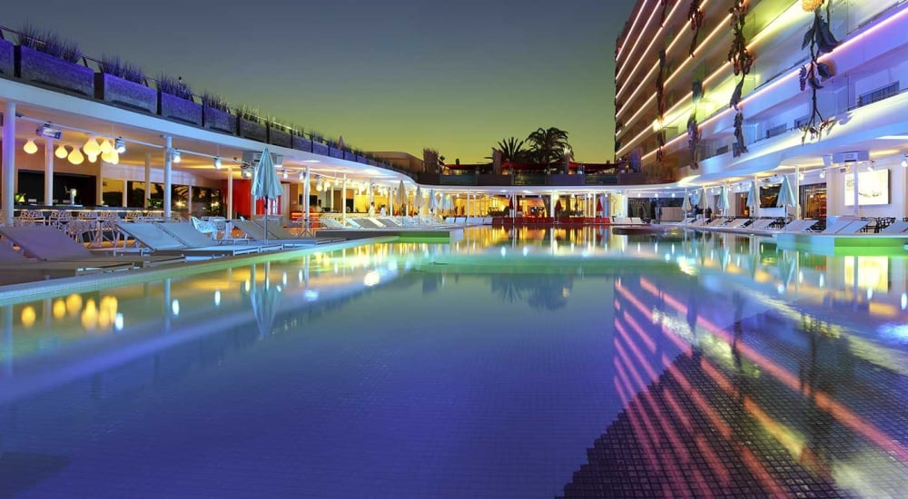Palladium hotel with a pool in the night