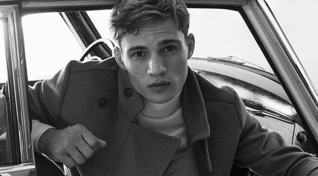 Massimo Dutti model posing inside a car