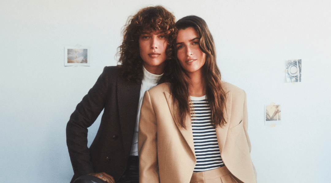 Two models posing for Mango family portraits