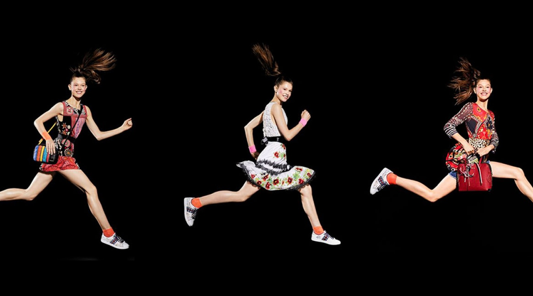 Three girls jumping with different outfits for Desigual